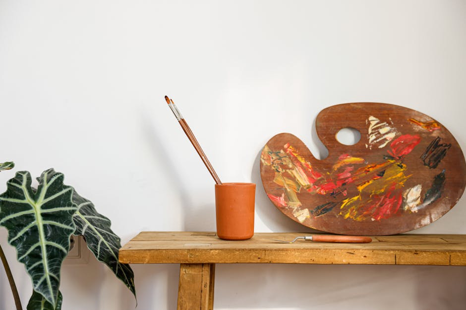 Verschillende tinten terracotta kussens op bank.